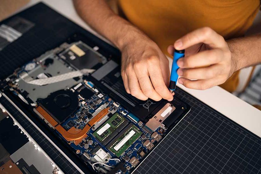 An individual working on a computer